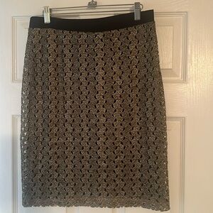 lined skirt, light material, Sunny Leigh size medium, excellent condition.